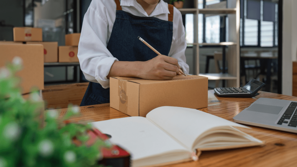 a small business owner preparing package