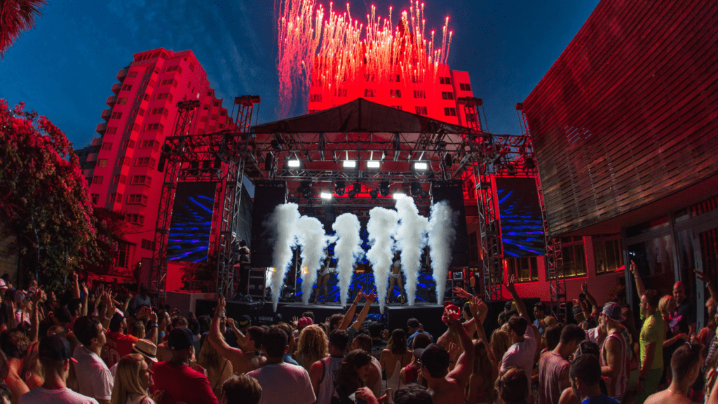 crowd of people in a festival concert