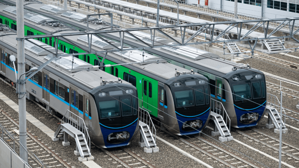 blue and white train in train station